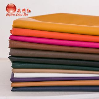 超薄羽絨服布料PU皮柔軟人造皮革cos服皮褲仿真皮面料防水風面料